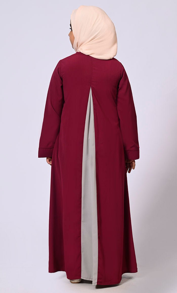 Pleated Perfection: Girl's Maroon Abaya with buttons detailing & Side Pockets