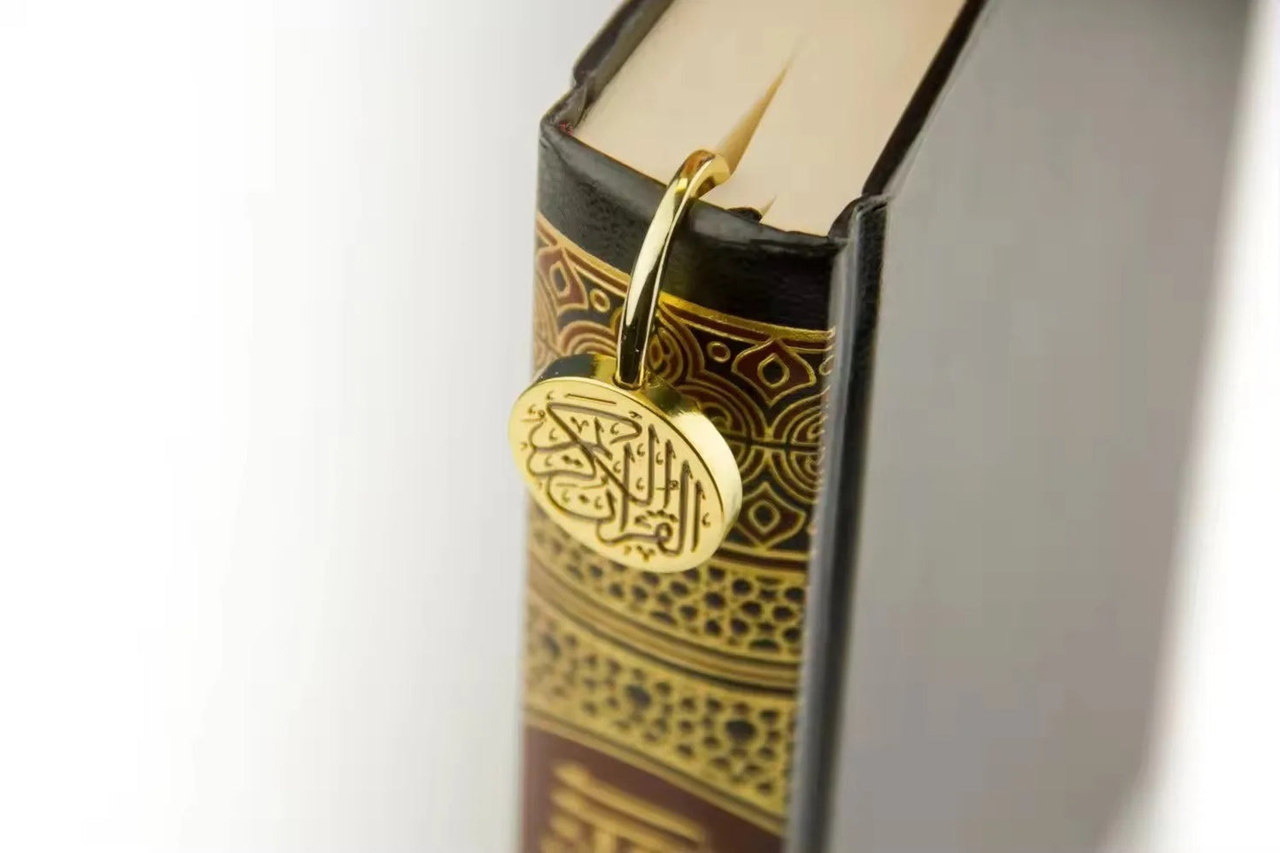 TNC Metallic gold bookmark