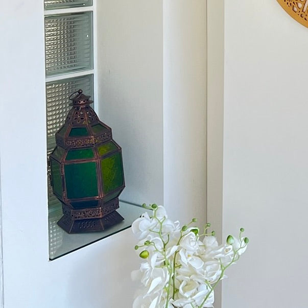Tall Bronze Lantern with Green Glass – A Radiant Symbol of Sacred Evenings